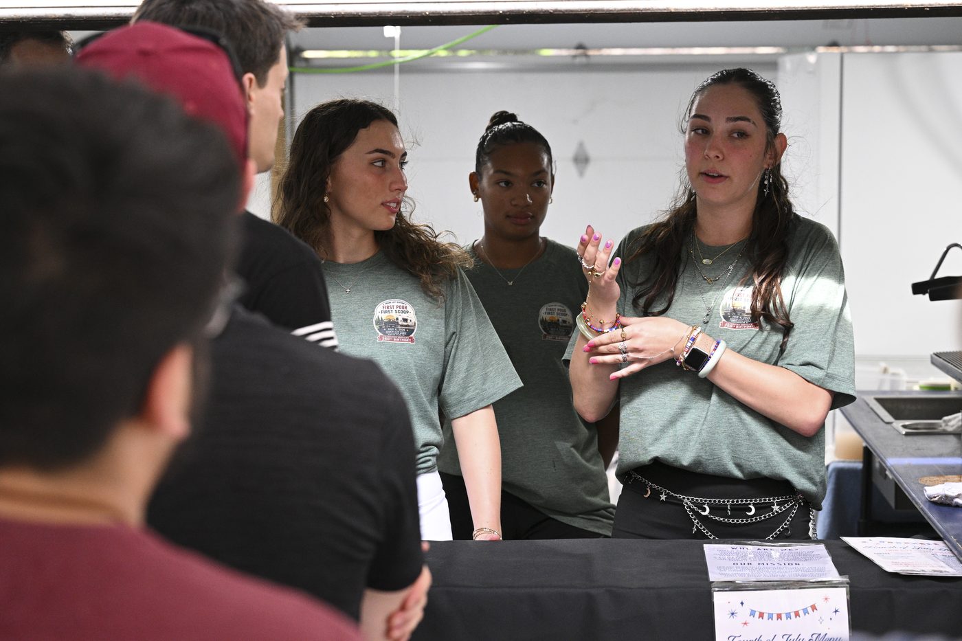 Twin City Silver Bullet crew members working the service window at the July 4, 2026 soft opening in Winston-Salem.
